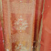 Vibrant Orange Glass Tissue Suit with Gold-Bordered Chiffon Dupatta